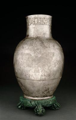 **The Vase of Enmetena. Silver and copper. H: 35 cm (13 13/16 in.); Dia: 18 cm (7 1/8 in.). From Tello, Iraq, c. 2400 BC. The Louvre Museum. Photo: RMN, Musée du Louvre / H. Lewandowski.**